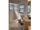 Well-lit bathroom with a tiled shower, updated fixtures, neutral color scheme and decorative rug at 116 Blackwater Ct, Kissimmee, FL 34743