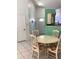 Dining area with natural light, tile floors, and easy access to other rooms at 116 Blackwater Ct, Kissimmee, FL 34743