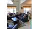 Bright living room featuring plush seating, large windows, and stylish decor at 116 Blackwater Ct, Kissimmee, FL 34743