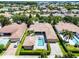 Bird's eye view of a home showcasing a backyard pool and manicured landscaping at 11755 Waterstone Loop Dr, Windermere, FL 34786