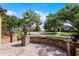 Charming front porch and brick-paved patio overlooking a peaceful, tree-lined street in a lovely neighborhood at 11755 Waterstone Loop Dr, Windermere, FL 34786