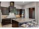 Well-equipped kitchen with granite countertops, stainless steel appliances, and a functional island at 11755 Waterstone Loop Dr, Windermere, FL 34786