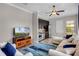 Kitchenette area with granite countertops and modern appliances flows into the living space, creating a versatile living area at 11755 Waterstone Loop Dr, Windermere, FL 34786