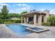 Relaxing pool and spa with fountains and lush landscaping providing a private oasis at 11755 Waterstone Loop Dr, Windermere, FL 34786