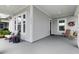 Inviting front porch with ample seating space, perfect for relaxing and enjoying the neighborhood views at 1212 Civitas Way, Winter Garden, FL 34787