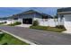 View of the garage in the rear of this house at 1212 Civitas Way, Winter Garden, FL 34787
