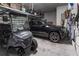 Spacious garage featuring ample room for parking a car and a golf cart at 1212 Civitas Way, Winter Garden, FL 34787