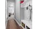 Hallway with built-in shelving, offering storage solutions and leading to a living space at 1212 Civitas Way, Winter Garden, FL 34787