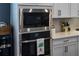 Close-up of modern kitchen appliances and stylish cabinetry at 1212 Civitas Way, Winter Garden, FL 34787