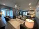 Bright, open living room layout flows into the kitchen, with lots of natural light at 1212 Civitas Way, Winter Garden, FL 34787