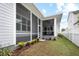 Cozy screened-in porch with fan, seamlessly blending indoor comfort with outdoor serenity at 1212 Civitas Way, Winter Garden, FL 34787