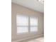 Well-lit room featuring carpet, neutral color paint, and windows with horizontal blinds at 1272 Patterson Ter, Lake Mary, FL 32746
