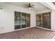 Covered outdoor patio with brick flooring and views of the backyard pool, perfect for outdoor entertaining at 1272 Patterson Ter, Lake Mary, FL 32746