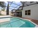 A screened-in pool and patio create a private oasis for outdoor enjoyment and relaxation at 1272 Patterson Ter, Lake Mary, FL 32746