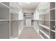 Spacious walk-in closet with custom shelving and storage, providing ample space for organization at 1272 Patterson Ter, Lake Mary, FL 32746