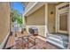 Outdoor patio featuring brick pavers, a dining table set, and a covered grill at 1356 Coralstone Dr, Celebration, FL 34747
