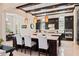 Open kitchen with pendant lighting, dark wood cabinetry, granite countertops, and modern design at 13661 Granger Ave, Orlando, FL 32827