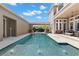 Beautiful backyard swimming pool with blue tile, surrounded by a patio and lush landscaping at 13661 Granger Ave, Orlando, FL 32827