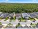 Stunning aerial view showcases the property and its surroundings with lush greenery at 14072 Alafaya Oak Bnd, Orlando, FL 32828