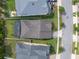 Birds eye of the house, screened in patio, next to other houses in a lovely neighborhood at 14072 Alafaya Oak Bnd, Orlando, FL 32828