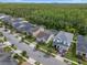 Overhead shot of neighborhood highlighting this house with lush landscaping at 14072 Alafaya Oak Bnd, Orlando, FL 32828