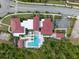 A picturesque community pool surrounded by beautiful landscaping, offering a relaxing escape at 14072 Alafaya Oak Bnd, Orlando, FL 32828
