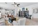 Spacious living area with open layout, modern furnishings, and natural light at 14072 Alafaya Oak Bnd, Orlando, FL 32828