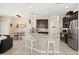 Spacious kitchen featuring stainless steel appliances and a large island with seating at 1501 Prairie Oaks Dr, St Cloud, FL 34771
