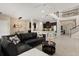 Bright, open living area features a soaring ceiling, staircase and seamless flow to the kitchen at 1501 Prairie Oaks Dr, St Cloud, FL 34771