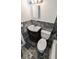 Updated bathroom with stylish tile flooring, a modern vanity, and a new toilet at 1507 Sw 4Th St, Ocala, FL 34471