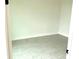 Room with light tile floor, white walls and trim at 15083 Grove Lake Dr, Winter Garden, FL 34787