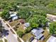 An aerial perspective of the neighborhood, demonstrating the property's setting among mature trees and residential streets at 1906 S Summerlin Ave, Sanford, FL 32771