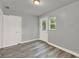 Bright room with hard surface floors, neutral paint, closet, and natural light at 1906 S Summerlin Ave, Sanford, FL 32771
