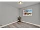 Bright bedroom with hard surface floors, neutral paint, and natural light at 1906 S Summerlin Ave, Sanford, FL 32771