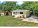 Quaint home with a well-kept lawn and landscaping, offering great curb appeal at 1906 S Summerlin Ave, Sanford, FL 32771