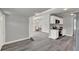 The house features an open layout, with new flooring, and grey neutral paint at 1906 S Summerlin Ave, Sanford, FL 32771