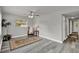 Bright living room with ceiling fan, hard surface floors, and neutral paint at 1906 S Summerlin Ave, Sanford, FL 32771
