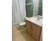 Clean bathroom with a shower-tub combination and light-colored vanity at 1921 Stone Abbey Blvd, Orlando, FL 32828