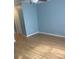 Bedroom with light wood floors and neutral paint at 1921 Stone Abbey Blvd, Orlando, FL 32828