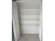 Walk in closet with wire shelving and white doors at 1921 Stone Abbey Blvd, Orlando, FL 32828