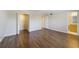 Spacious bedroom with wood floors and a large closet, offering plenty of storage space at 1948 Conway Rd # 8, Orlando, FL 32812