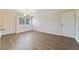 Inviting dining space with chandelier and modern vinyl flooring at 1948 Conway Rd # 8, Orlando, FL 32812