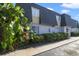 Charming condominium complex with well-maintained landscaping and a neatly paved walkway at 1948 Conway Rd # 8, Orlando, FL 32812