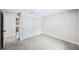 Bedroom featuring neutral carpet and closet space at 1957 Deloy Dr, Daytona Beach, FL 32119