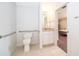 Accessible bathroom with granite countertops, grab bars and tile floors at 2498 Iris Rd, Deland, FL 32724