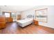Large bedroom with hardwood floors, natural lighting and furnishings at 2498 Iris Rd, Deland, FL 32724