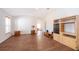 Large living room featuring high ceilings, hardwood floors and access to other rooms at 2498 Iris Rd, Deland, FL 32724
