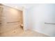 Shower stall with shower seat and grab bars for accessibility at 2498 Iris Rd, Deland, FL 32724