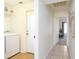 Hallway view near the laundry room that leads to the main bedroom at 254 Oak Park Pl, Casselberry, FL 32707