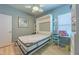 Murphy bed showcased in bedroom setup with desk, chair, and modern decor at 2941 Marlberry Ln, Clermont, FL 34714